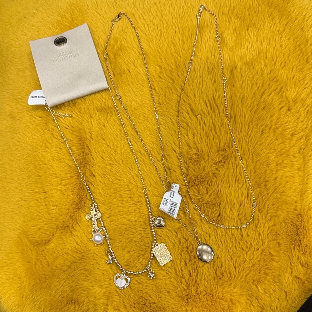 Urban Outfitters- bundle layered Gold Charm Necklace set